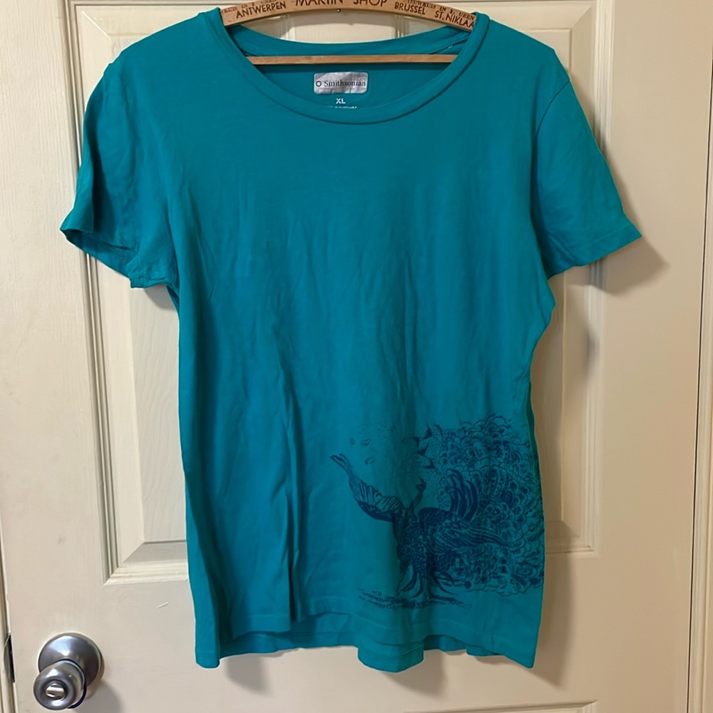 Teal tee with Peacock graphic